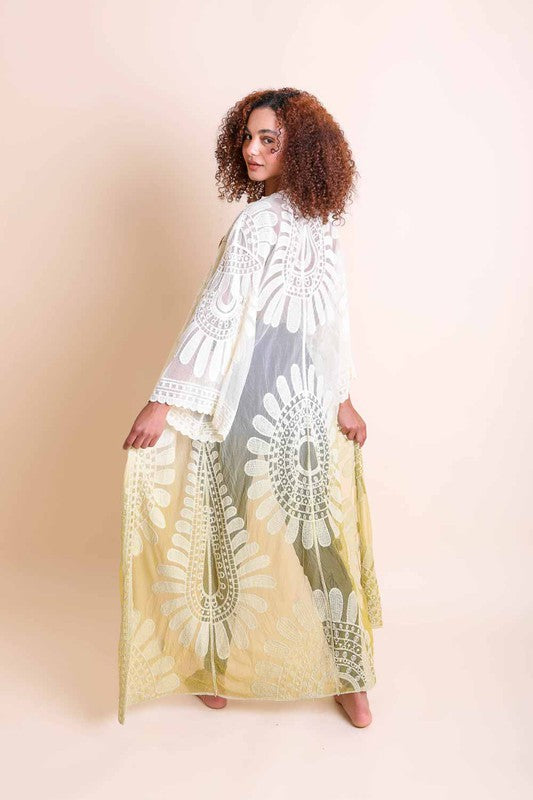 modeling wearing sheer flower kimono