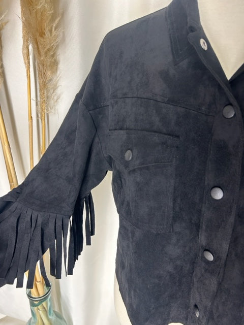 faux suede black fringe jacket focusing on detail of sleeve