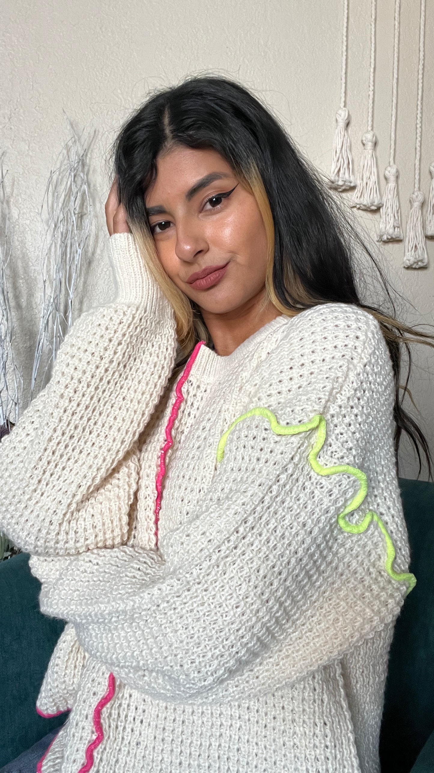 model wearing cream waffle knit sweater in size small to show off the oversized look