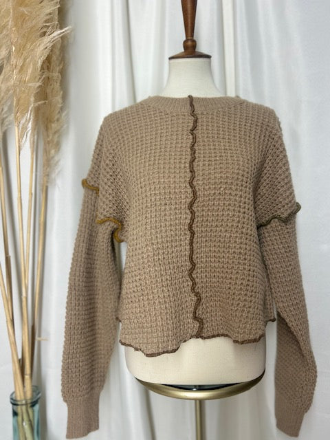oversized brown waffle knit mock neck sweater with contrast olive and light brown stitching detail on arms